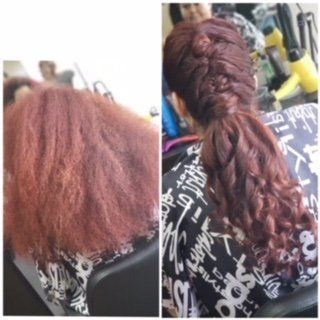 Side-by-side salon view of a red-brown hairstyle before and after braiding into a long braid.