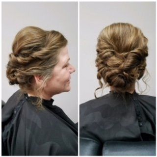 Side and back views of an elegant updo hairstyle with twisted blonde hair in a salon chair